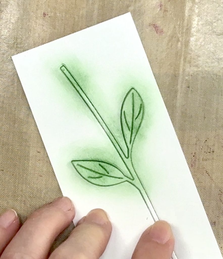 Screen shot showing the Rustic Wilderness Distress Ink on the stem of the Simon Says Stamp die set.