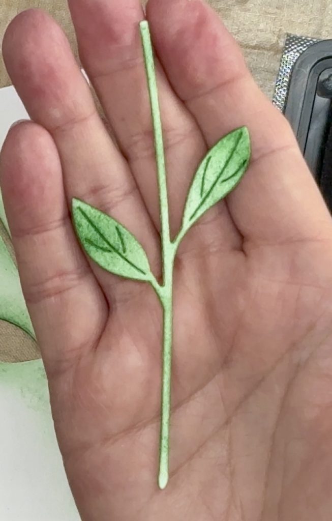 Screen shot showing the stem after inking the ends of the leaves a bit more with the Distress Ink for today's Easy Clean And Simple Layered Floral Birthday Card.