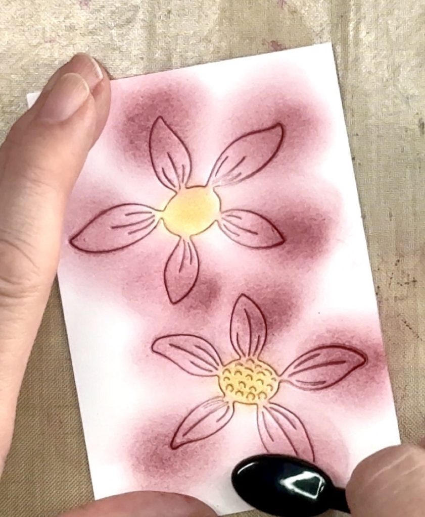 Screen shot showing the extra bit of color added to just the tips of the etched layered daisy petals for today's Easy Clean And Simple Layered Floral Birthday Card.