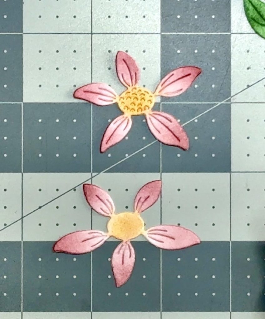 Screen shot showing how to line up the Etched Layered Daisy blossoms with one petal up and one petal down.