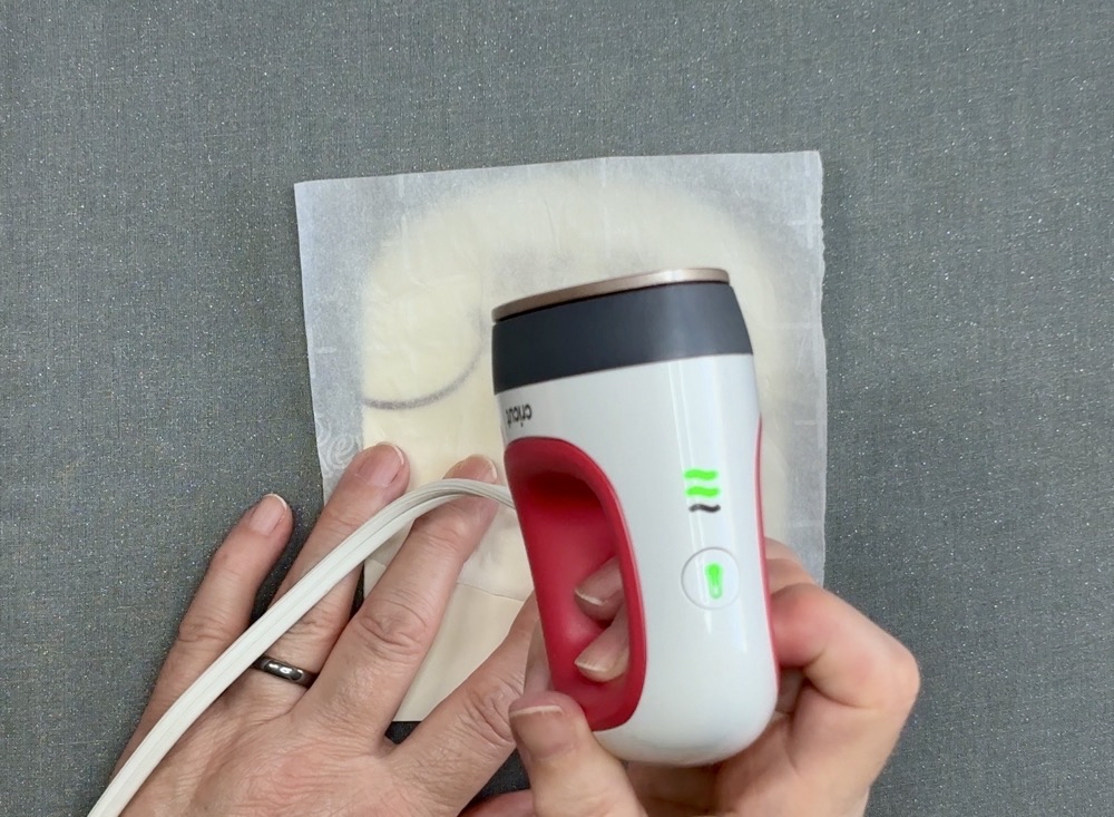 Screen shot of the Cricut Mini EasyPress showing a green light after it has reached the proper temperature.