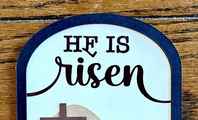 Photo of the original Faith-Inspired Easter Card with Cricut where I did not pay enough attention when removing the carrier sheet and the letter โEโ is now messed up.
