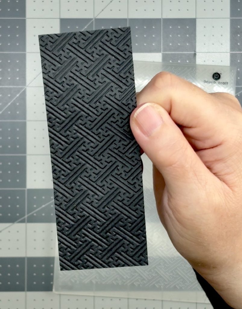 Photo of the embossed cardstock panel used in some of todayโs One Card Design, Endless Creative Looks projects.