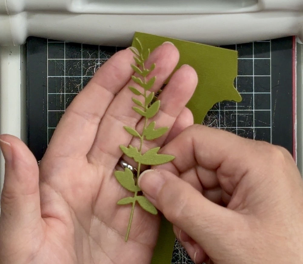 Photo of the die cut after being removed from the surrounding card used in todayโs One Card Design, Endless Creative Looks project.