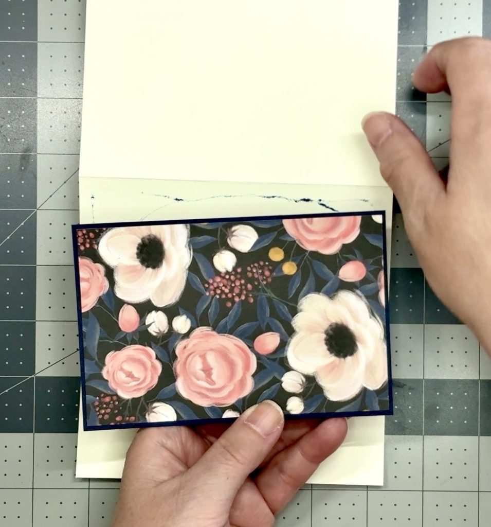 Screen shot showing how I am making sure to adhere the 3” panel to the back of the card correctly by holding it in the direction it should be glued.