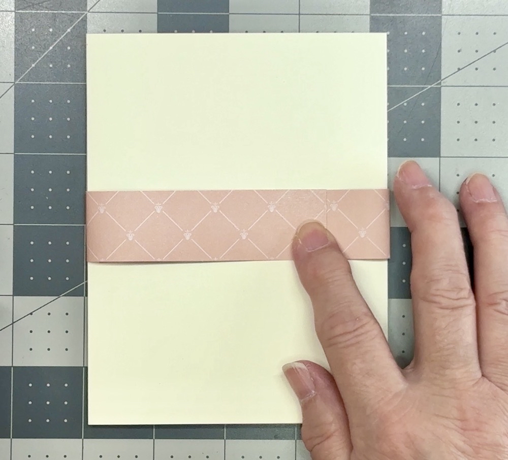 Screen shot showing the right side of the belly band wrapped around the back of the card without creasing it for today’s Easy Overlapping Tri-Panel Fun Fold Card project.