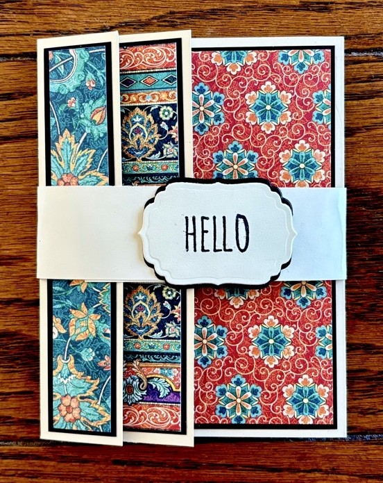 Photo of the second Easy Overlapping Tri-Panel Fun Fold Card featuring Graphic 45 paper and a Tim Holtz stamp for the sentiment.