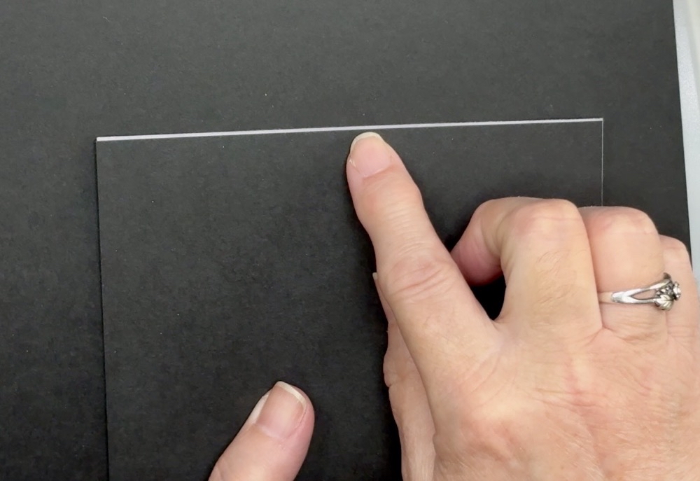 Screen shot showing the amount of cardstock from the front panel that will need to be trimmed to make the card a complete A2 size of 5.5” x 4.25” for today’s 2026 Graduation Gift Card Holder project.