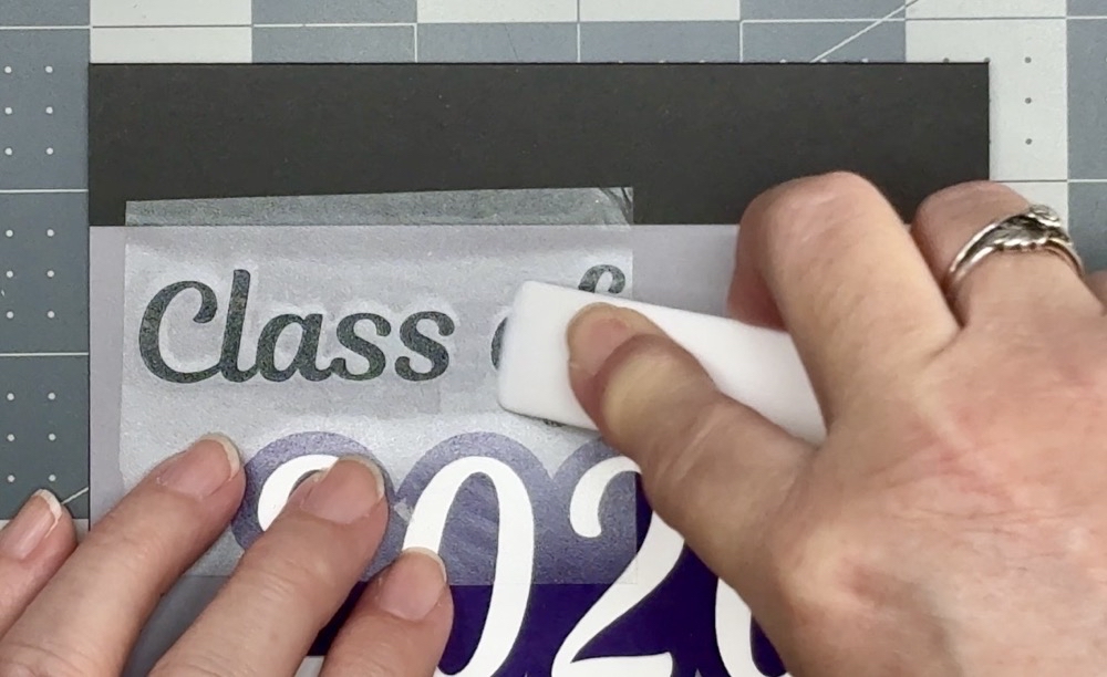 Screen shot showing the burnishing needed to ensure the vinyl is stock securely to the cardstock.