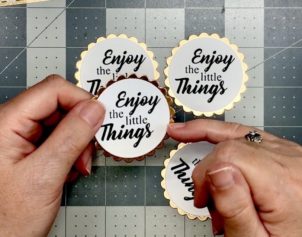 Screen shot showing the finished sentiments glued to the rose gold mats.