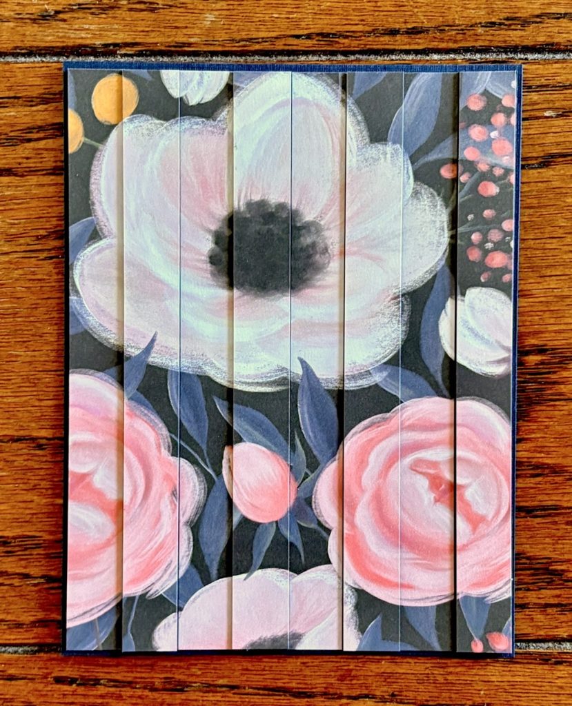 Photo of an unfinished vertical double vision card front featuring pattern paper from the Recollections Fantasy Floral paper pad for todayโs How to Make Beautiful Double Vision Cards Easily post.