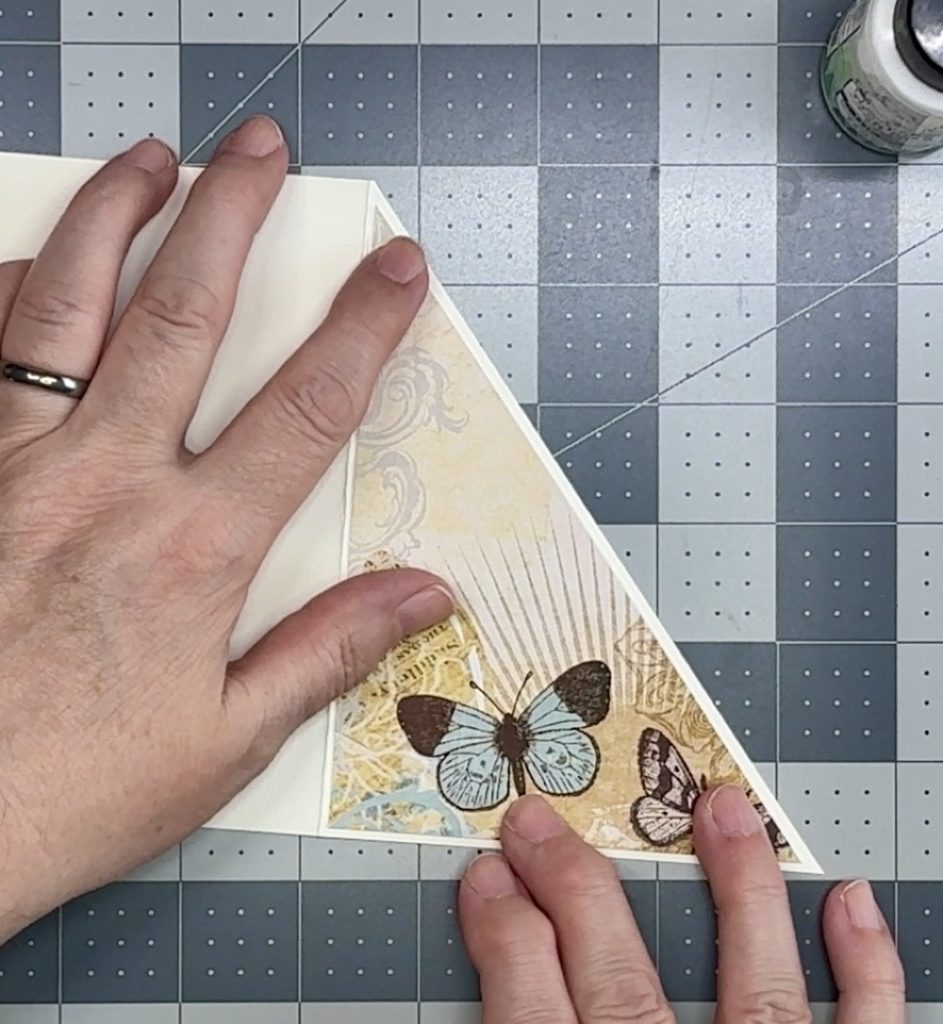 Screen shot showing the application of the pattern paper to the diagonal cut card front.