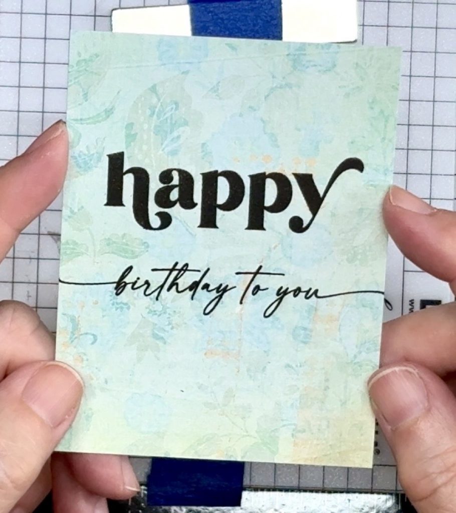 Screen shot showing the finished sentiment ready to adhere to the Joy Fold flap.