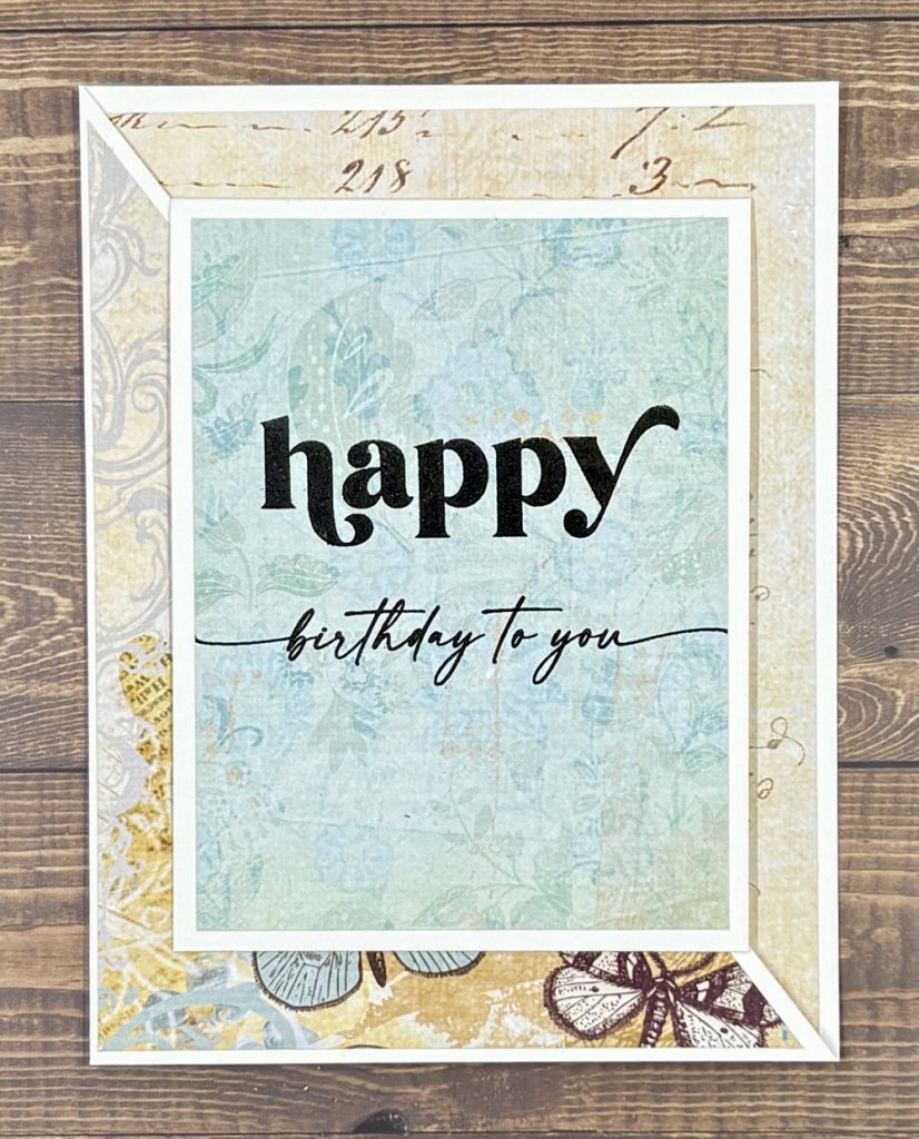 Screen shot showing the finished Happy Birthday to you Diagonal Joy Fold Card featuring pattern paper from Die Cuts with a View.
