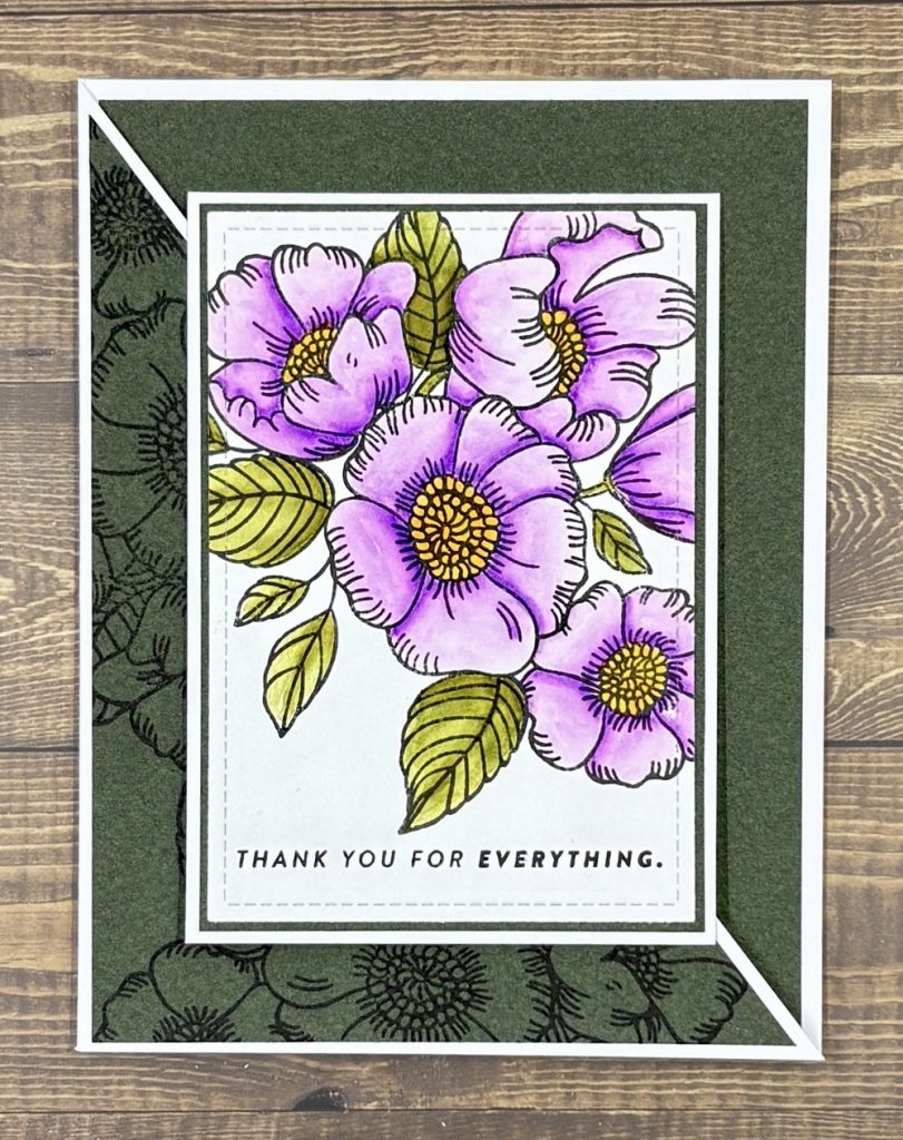Photo shows another Diagonal Joy Fold card featuring a stamp set from Simon Says Stamp colored with Zig Clean Color Real Brush Markers.