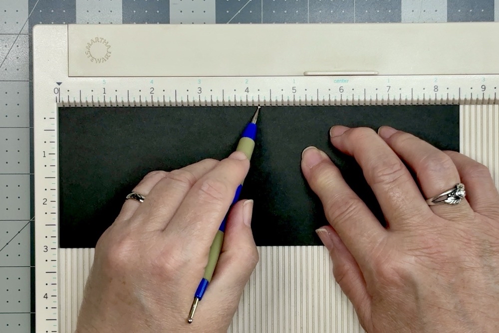 Screen shot showing to score the 3” x 8.5” flap cardstock piece in half at 4.25” for today’s How to Make a Front Flip Fun Fold Card project.