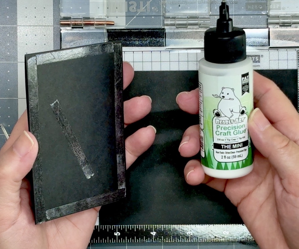 Screen shot showing the application of both ¼” scor-tape and Bearly Art Precision Glue to adhere the front flap panel to the card base.