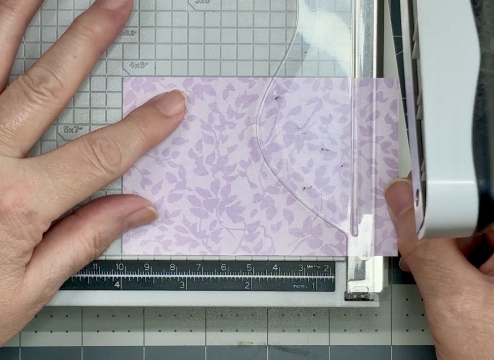 Screen shot showing cutting the scrap of pattern paper to the correct height of 4” for today’s How to Make a Front Flip Fun Fold Card project.