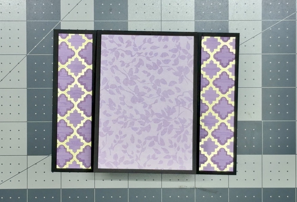 Screen shot showing the finished application of the patter paper to the front of the card base for today’s project.
