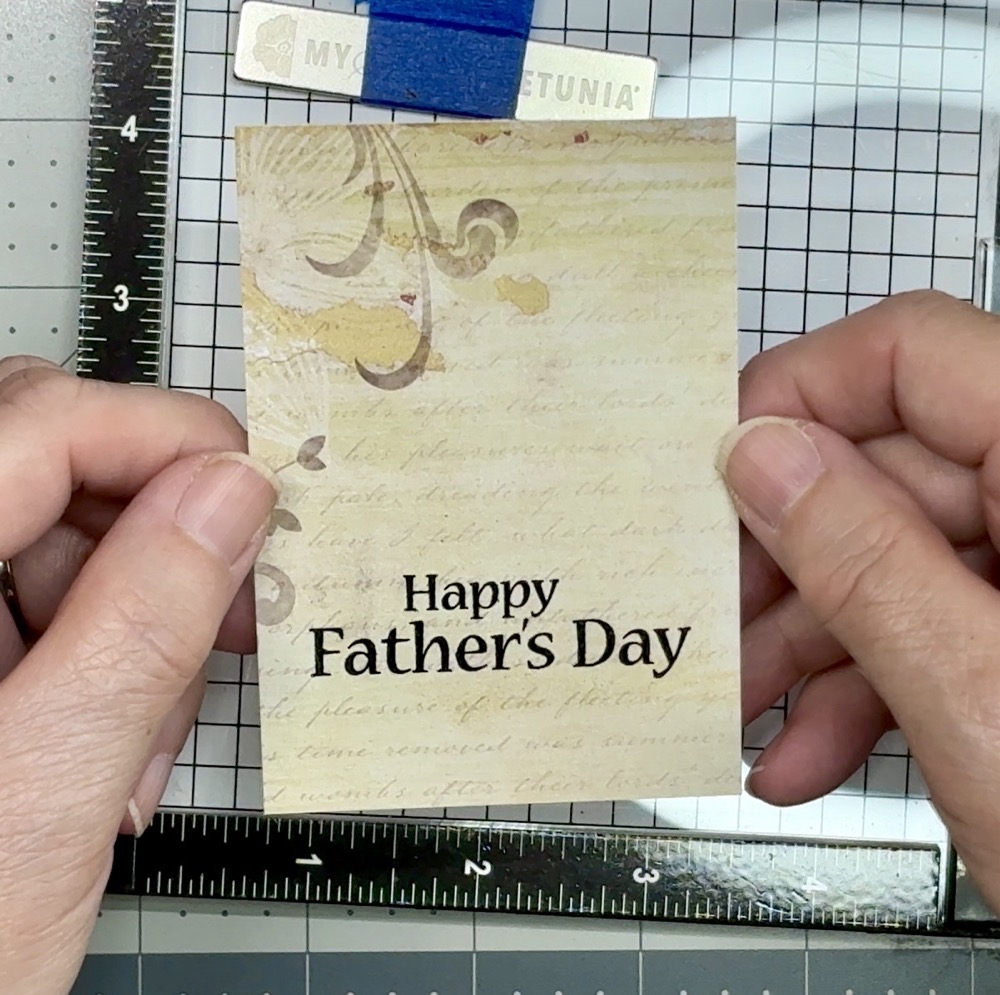 Screen shot showing the finished Happy Father’s Day sentiment stamped on the Habitat pattern paper.