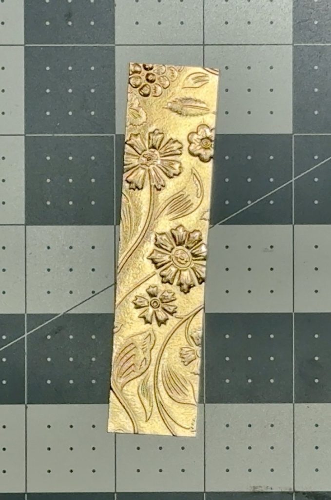 Screen shot showing an embossed piece of Rose Gold Foil Cardstock Paper from Recollections that was the inspiration for a third card tutorial.