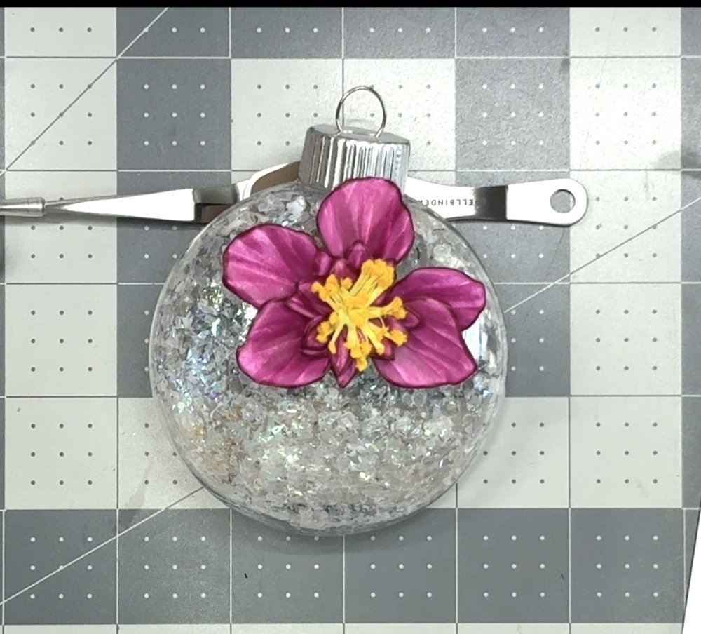 Screen shot showing the flower adhered to the ornament for today’s Handmade Christmas Ornament with a Cardstock Flower post.
