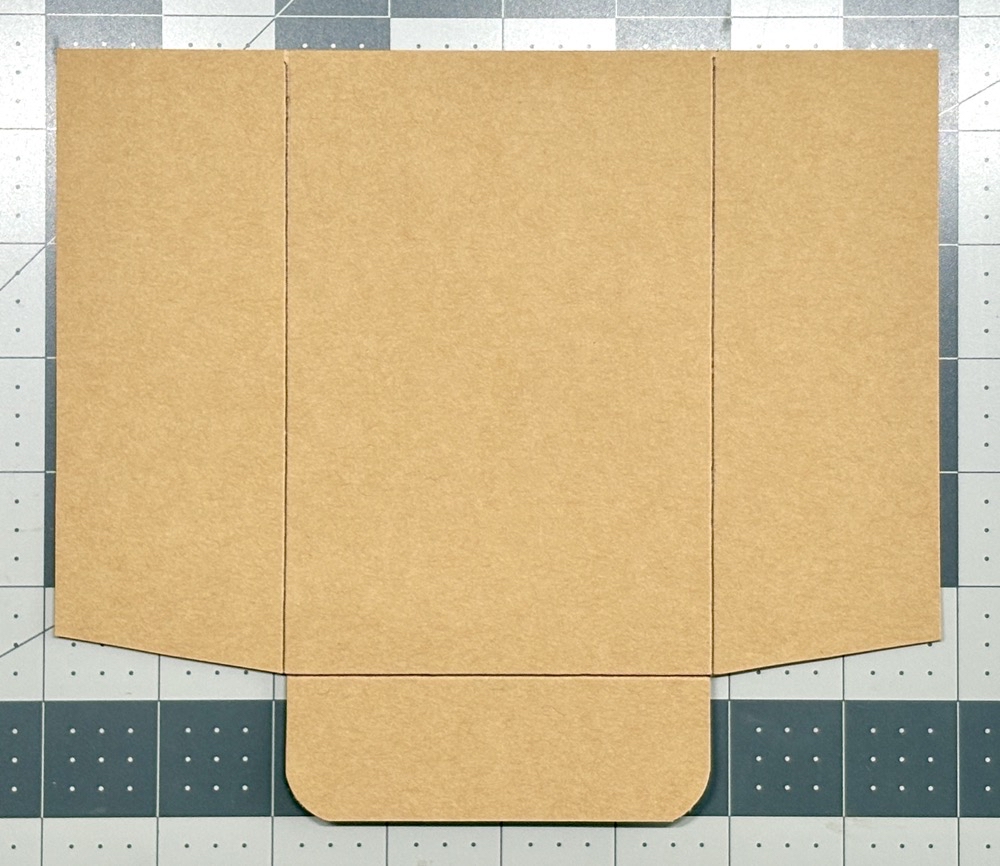 Photo showing the kraft cardstock ready to be folded for today’s DIY Gift Card Envelopes in Three Easy Designs post.