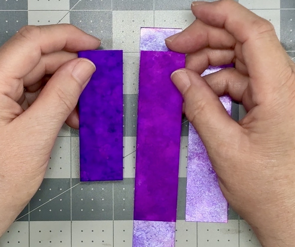 Screen shot showing the different shades of purple that the alcohol ink scraps are, two darker than the other.