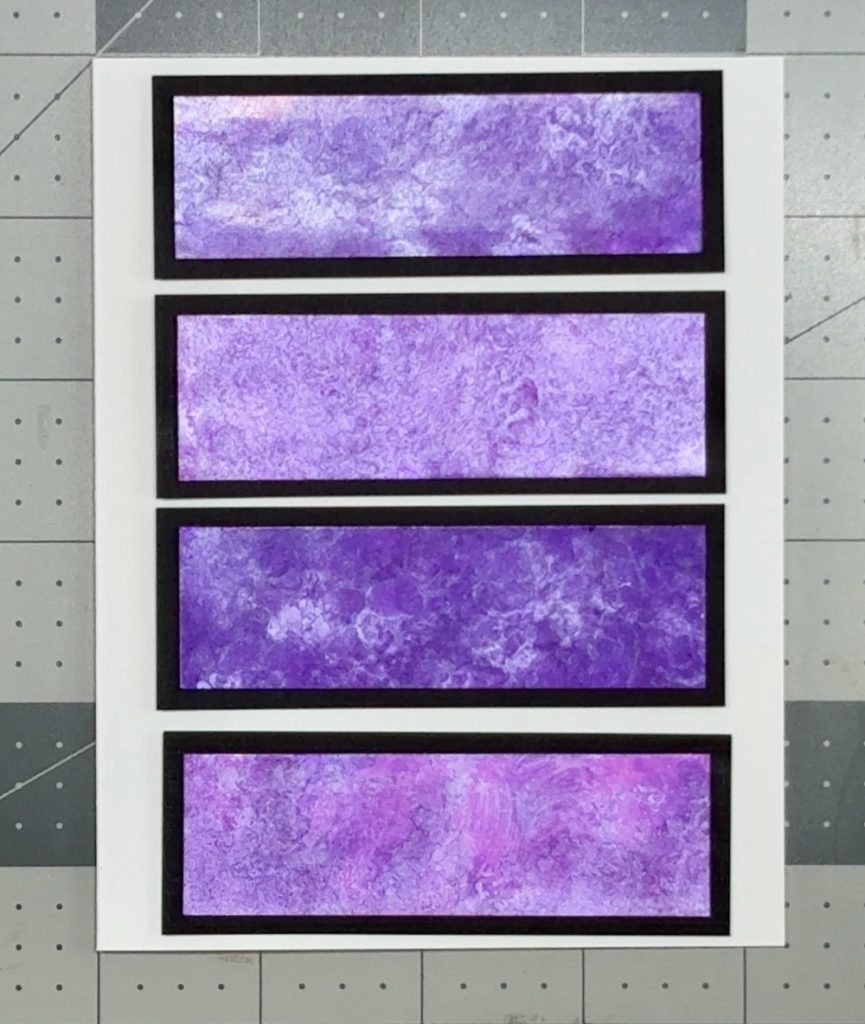 Screen shot showing the first design option for today’s Make a Beautiful Card from Paper Scraps project, adding the four strips in a straight column down the center of the card.