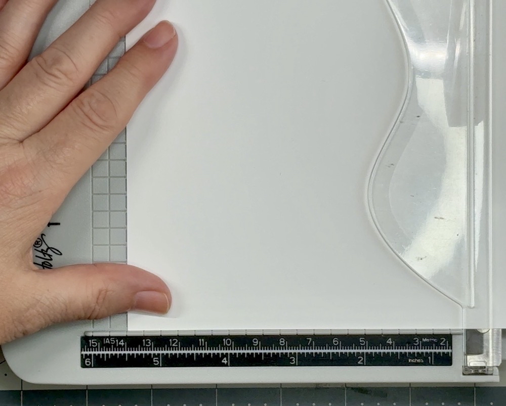 Screen shot showing the white Recollections 110lb card stock being cut to a height of 5 ½” for the card base.