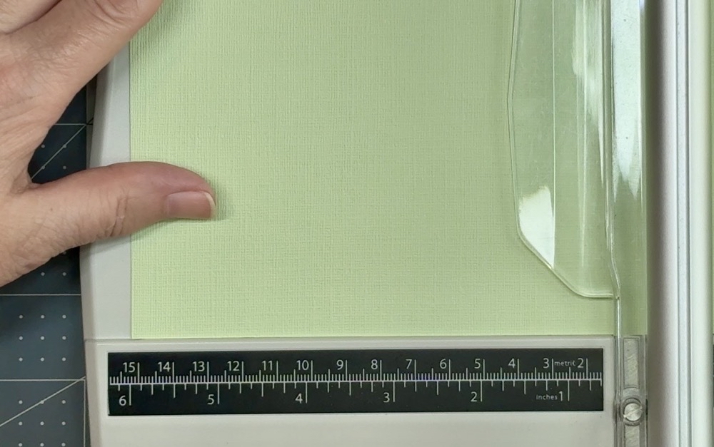 Screen shot showing the light green Bazzill Basics cardstock being cut to a width of 6” for the first card mat.