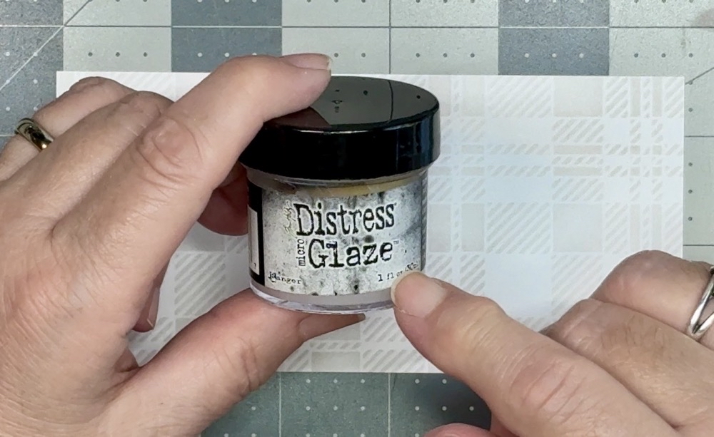 Screen shot showing Distress Micro Glaze that will be used to protect the water-reactive Distress ink on the card mat.