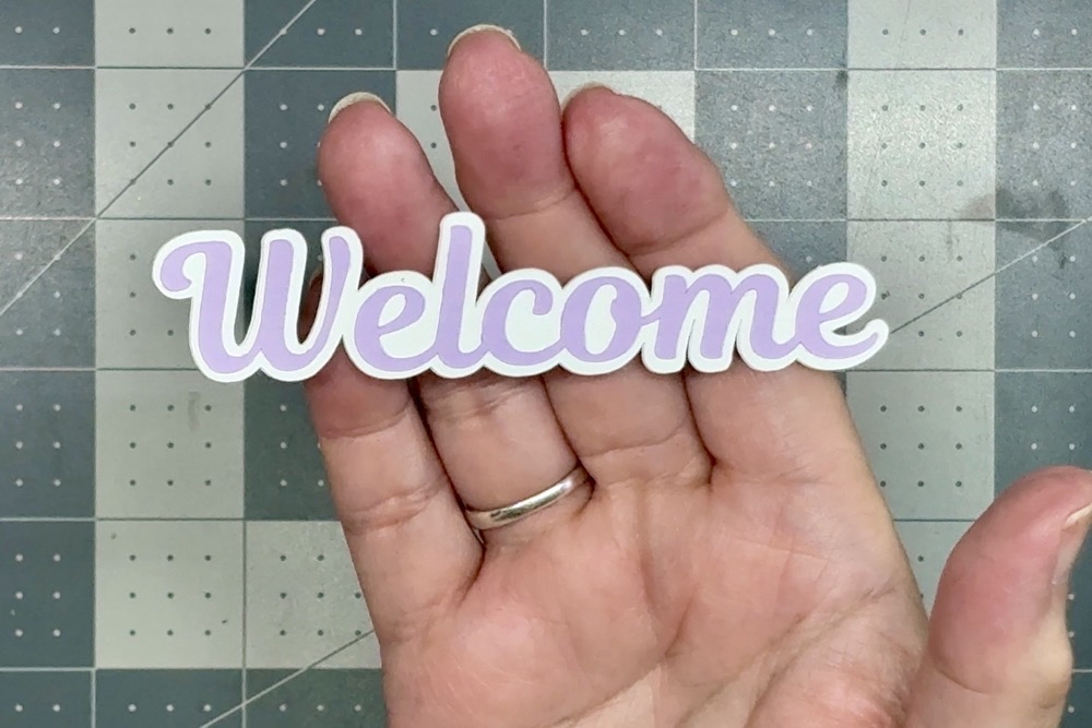 Screen shot showing the finished Welcome Sentiment ready to be placed on the card.