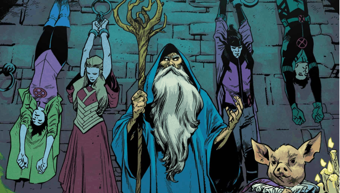 Merlin stands before four chained X-Men, Jubilee, Meggan Braddock, Gambit, and Richtor.