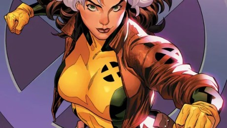 Variant comic book cover for Uncanny X-Men #34 featuring Rogue in her classic yellow-and-green X-Men uniform and brown jacket, with her distinctive white-streaked brown hair. She stands in a dynamic fighting pose with clenched fists against a purple background featuring the X-Men logo.
