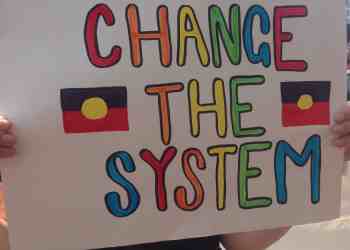 ||Image of a placard with handwritten text: "We can disagree and love eachother unless your disagreement is rooted in my oppresion and denial of my humanity and right to exist" Robert Jones