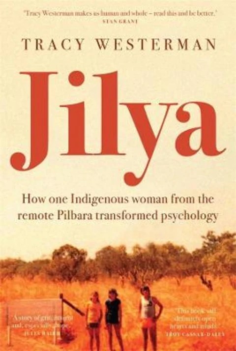 Cover the book Jilya which has a group of children standing in front of scrubland
