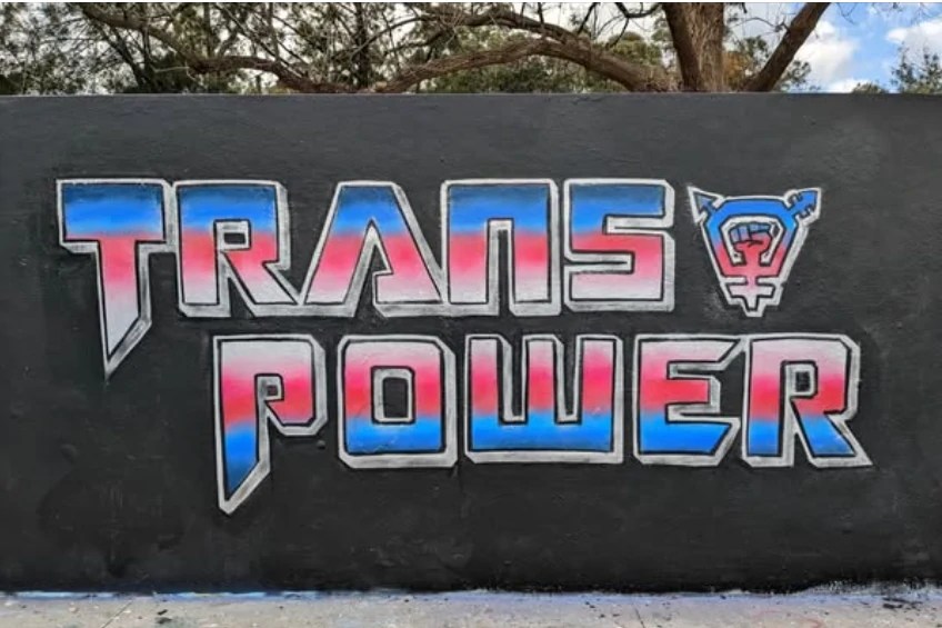 Mural that reads Trans Power in Transformer style lettering