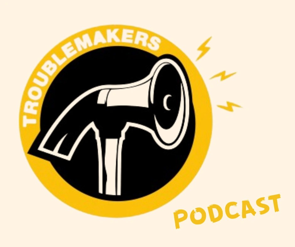 Text reads "Troublemakers podcast". A loudspeaker is combined with a hammer.
