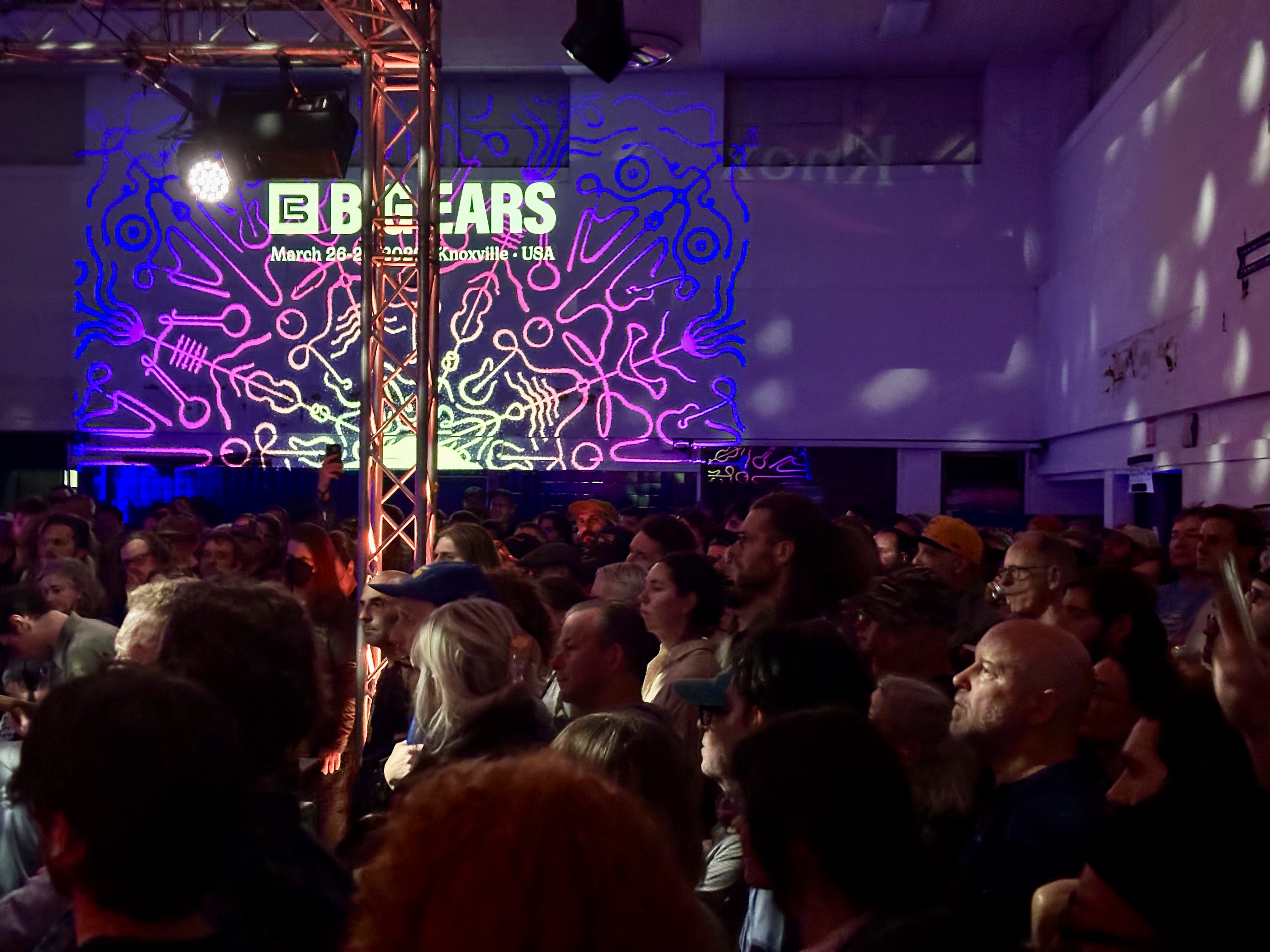 A Big Ears crowd at the old Greyhound station watches the jazz band SML,