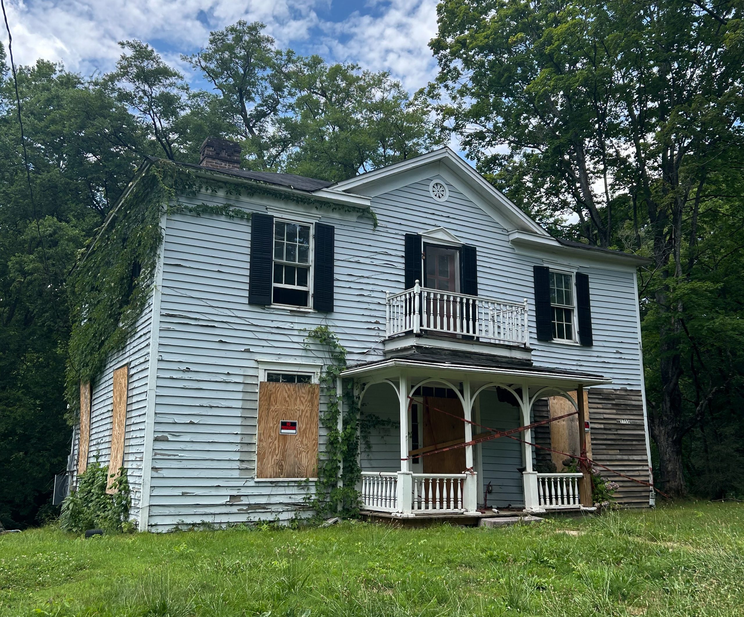 A photo of the aging Alfred Buffat homestead on Loves Creek Road.