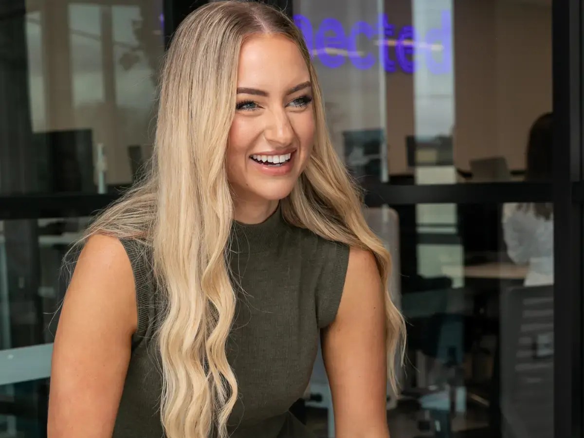 Connected Media Group team member in the office