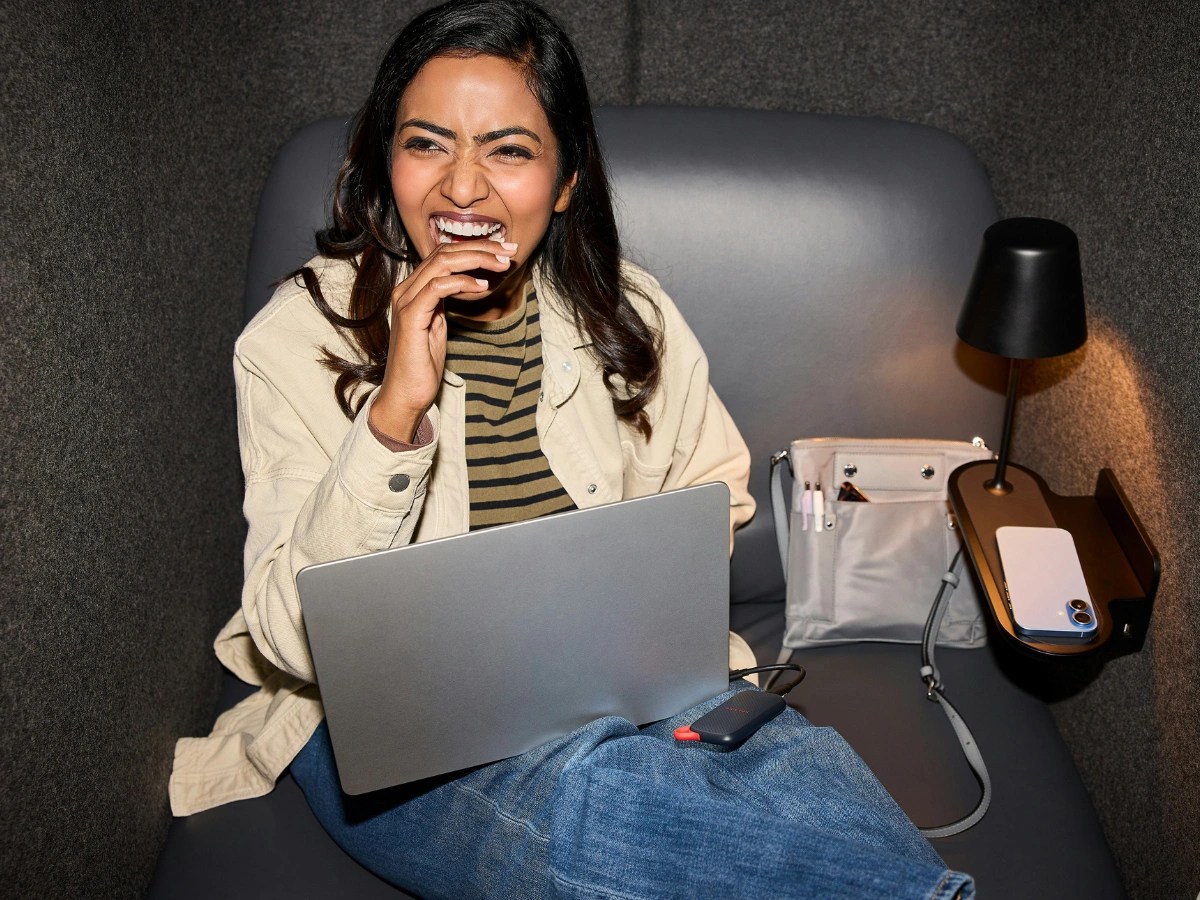 Professional using a laptop for paid search marketing
