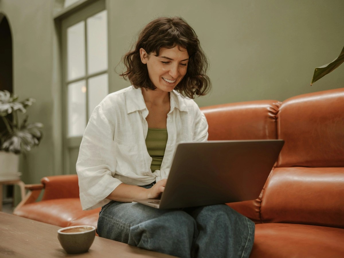 Woman using a laptop to browse Google Search Ads online