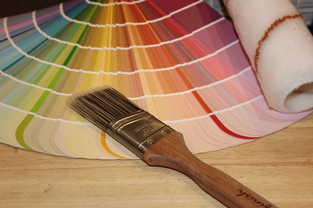 Paint color fan deck and brush for color consultation
