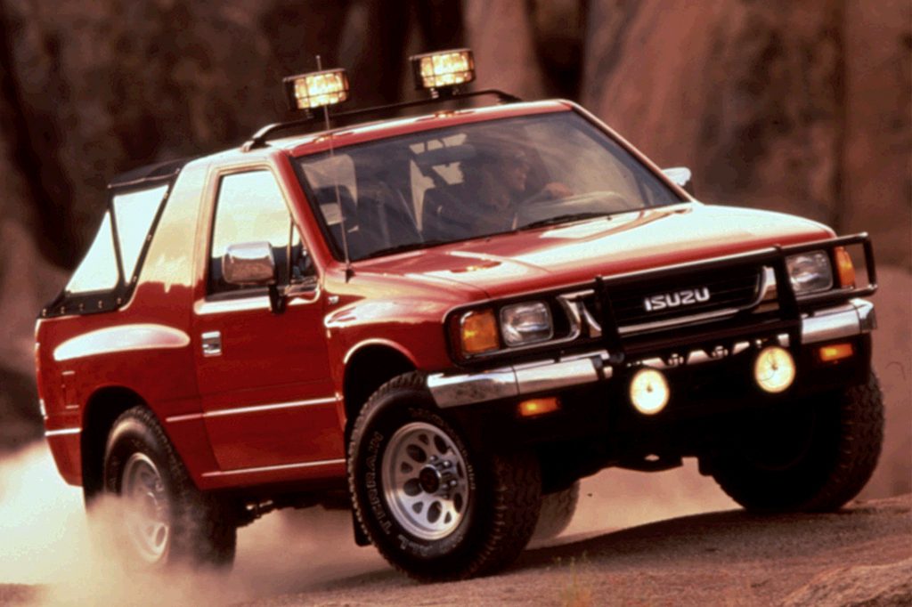 1990 94 Isuzu Amigo Consumer Guide Auto 1994 isuzu amigo Xs 4x4 convertble soft top and hard top 1991 Isuzu Amigo XS 26L 5-Speed 4X4 Soft Top 1990 ISUZU AMIGO S 26 LITER 5 SPEED MANUAL 4WD -NOT RUNNING- US 50000.