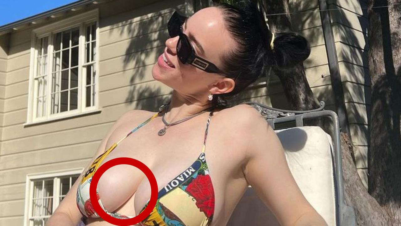 Billie Eilish reveals chest tattoo in rare bikini photo 