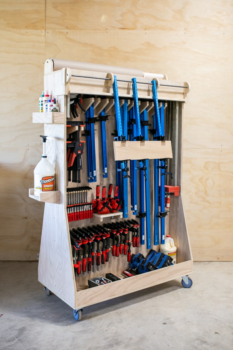 Mobile clamp rack on casters filled with clamps