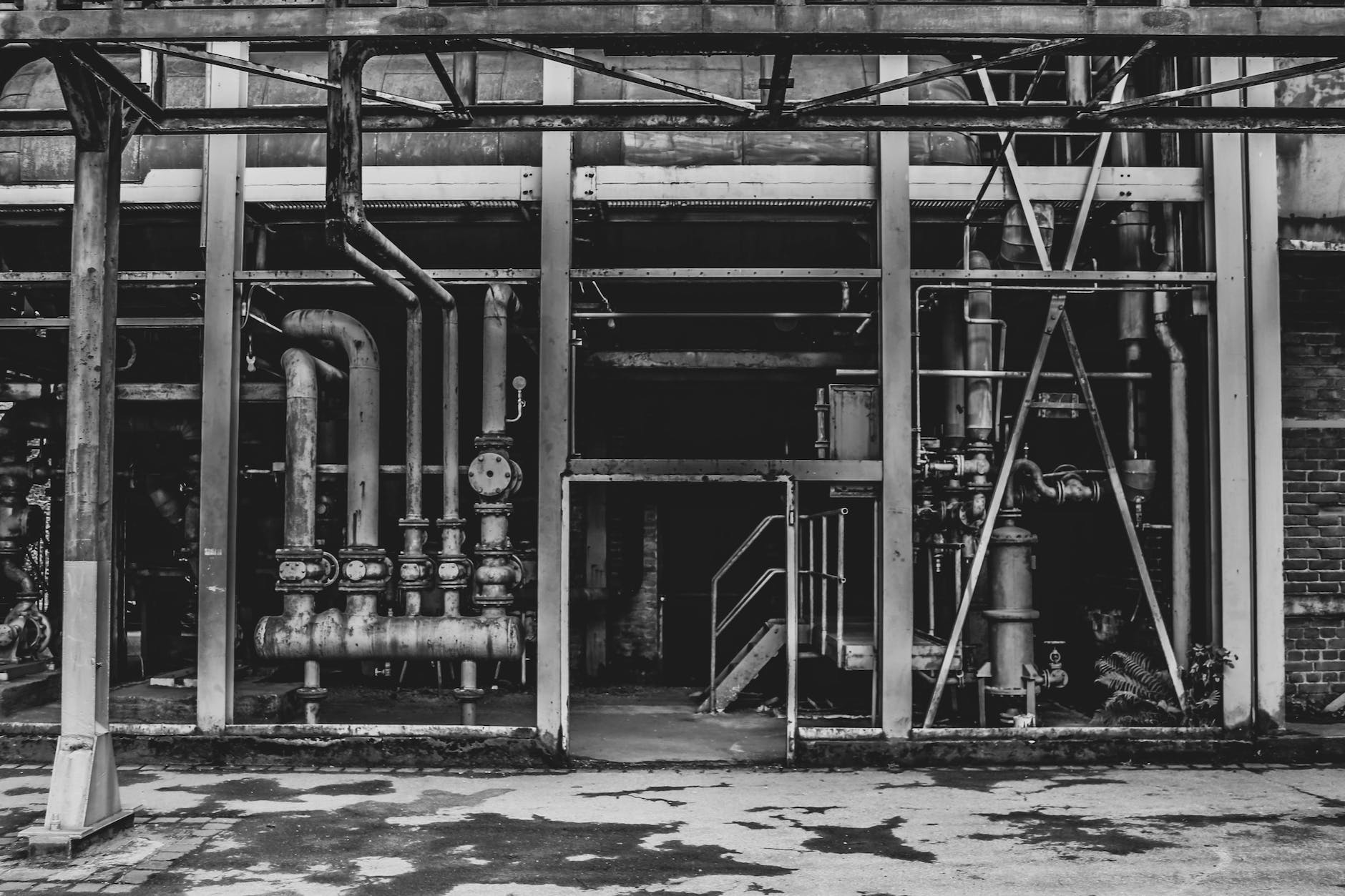 grayscale photo of building. How To Get Your C-4 California Contractors License (2023 Edition)