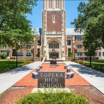 Topeka high school sign and school